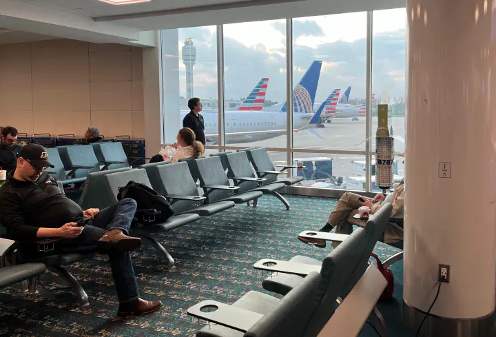 People waiting at an airport.
